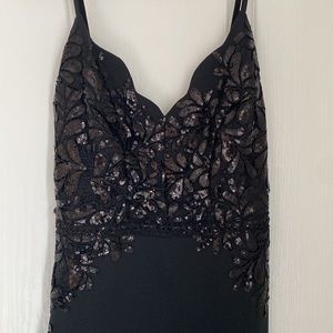 Black cocktail dress with sequins from Honey